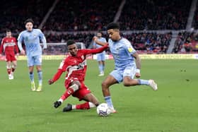 Middlesbrough's Isaiah Jones (left) and Coventry City's Ian Maatsen (Picture: PA)