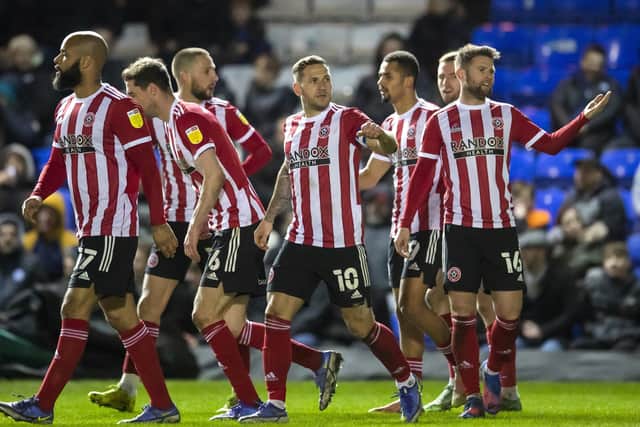 Sheffield United's Billy Sharp (centre) celebrates scoring their side's first goal of the game during the Sky Bet Championship match at the Weston Homes Stadium, Peterborough. (Picture: PA)