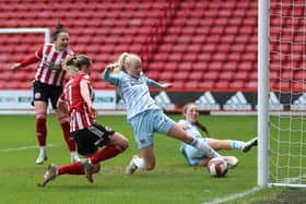 Sliding in: Bex Rayner, left centre, converts at the back post to get Sheffield United Women on level terms before Superleague side West Ham ran away with the FA Cup fourth-round tie. (Picture: Nigel French/pPA)