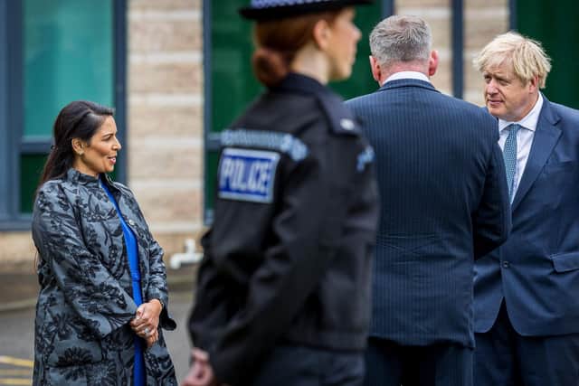 Boris Johnson and Priti Patel say the Government is committed to recruiting 20,000 police officers. They made this joint visit to North Yorkshire Police in July 2020. Photo: Charlotte Graham.