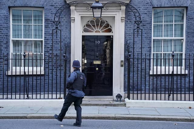 A police officer in Downing Street, London (PA)
