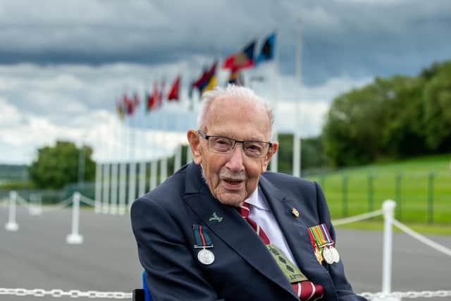 File photo of Captain Sir Tom Moore whose daughter has said she can still "see and feel" her father "in everything" a year after his death. The Second World War veteran inspired hope during the first national Covid-19 lockdown in 2020, raising Ł38.9 million for the NHS by walking 100 laps of his garden before his 100th birthday. He died on February 2 last year with coronavirus.