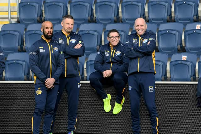 Watching on: The Leeds coaching staff at yesterday's photocall, including Jamie Jones-Buchanan, left, and Richard Agar, right. Picture: Simon Hulme