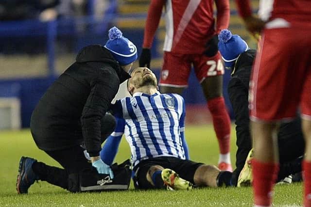 Owls defender Harlee Dean suffers a frustrating early injury, which forced him to leave the fray against Morecambe.