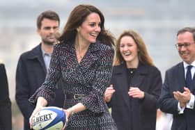 The Duchess of Cambridge is pictured at the Trocadero, joining in a game of rugby with school children during a visit to Paris. Kate has taken over the Duke of Sussex's former roles as patron of the Rugby Football Union and the Rugby Football League. (Photo: Dominic Lipinski/PA Wire)