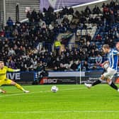BIG MOMENT: Jordan RHodes finds the net again for Huddersfield Town