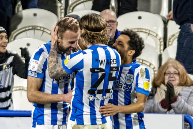 Danny Ward congratulates Jordon Rhodes scoring Town's second goal. (Picture: Tony Johnson)