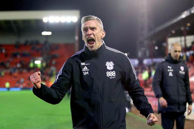 Cardiff City manager Steve Morison celebrates victory at Oakwell. (PA)