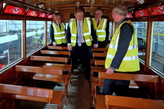 Boris Johnson boarded a vintage tram in Blackpool to showcase the Levelling Up White Paper.