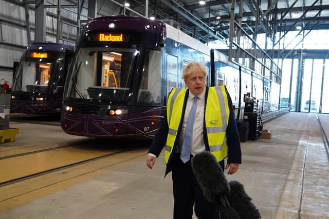 Boris Johnson visited a vintage tram in Blackpool to promote the Levelling Up White Paper.