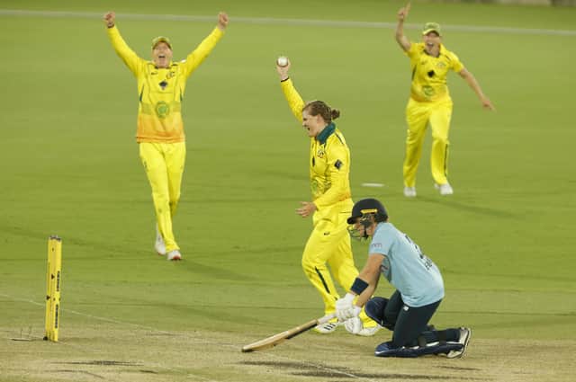GAME OVER: Australia's Jess Jonassen celebrates dismissing England's Kate Cross to win the first ODI and retain the Ashes in Canberra. Picture: Jenny Evans/Getty Images
