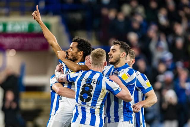 BREAKTHROUGH: Duane Holmes celebrates opening the scoring in Huddersfield Town's 2-0 win over his former club Derby County