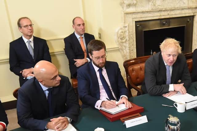 File photo dated 17/09/21 of (back, left to right) Martin Reynolds, the Prime Minister's principal private secretary, and Dan Rosenfield, the Prime Minister's chief of staff, and (front, left to right) Health Secretary Sajid Javid, Cabinet Secretary Simon Case, and Prime Minister Boris Johnson