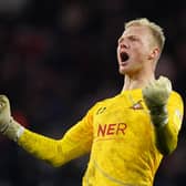 BIG WIN: Doncaster Rovers' goalkeeper Jonathan Mitchell celebrates after the final whistle at the Stadium of Light. Picture: PA Wire.