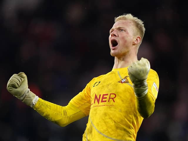 BIG WIN: Doncaster Rovers' goalkeeper Jonathan Mitchell celebrates after the final whistle at the Stadium of Light. Picture: PA Wire.