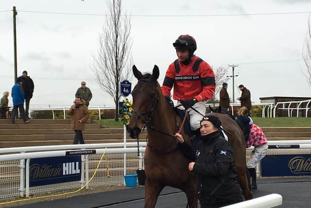 Derek Fox and Ahoy Senor return to the Wetherby winners' enclosure after their Towton win.