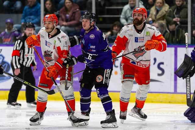 Tanner Eberle, left, and John Armstrong, right, in action during Sheffield Steelers' 6-3 win at Glasgow Clan on Sunday night. Picture: EIHL/Al Goold