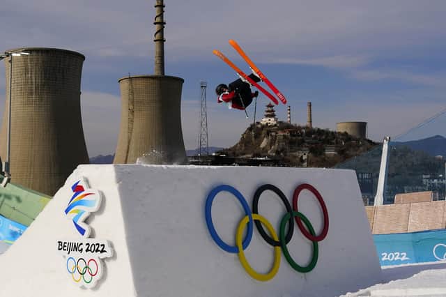 James Woods of Britain competes during the men's freestyle skiing big air qualification round of the 2022 Winter Olympics, Monday, Feb. 7. (AP Photo/Matt Slocum)