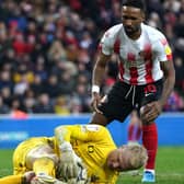 HOLDING ON: Doncaster Rovers' goalkeeper Jonathan Mitchell shields the ball from Sunderland's Jermain Defoe. Picture: Owen Humphreys/PA Wire.