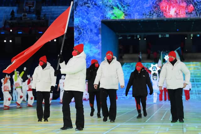Flag bearer Andre Marcano of Team Trinidad & Tobago leads their team during the Opening Ceremony of the Beijing 2022 Winter Olympics at the Beijing National Stadium on February 04, 2022. (Picture: David Ramos/Getty Images)
