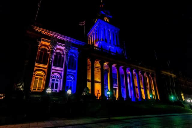 Leeds Town Hall lit up during a previous memorial related to the COVID-19 pandemic in January 2021. Picture: James Hardisty.