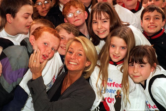 Gladiators host Ulrika Jonsson met young fans after opening The Pocket Phone Shop in Crossgates Shopping Centre in January 1998.