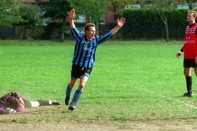 Manston's Ian Rowell scores the winner in extra time of a County Cup clash in October 1997 against Windmill whose keeper Noel Martin can't bear to look.