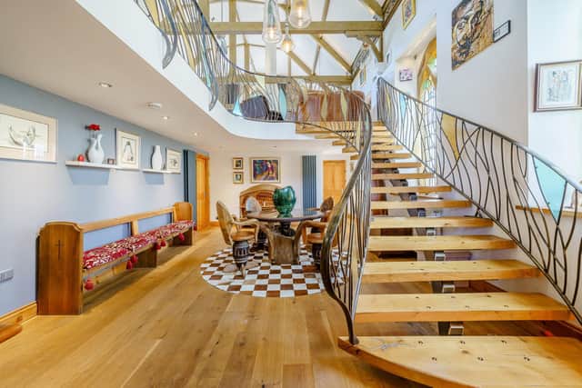 The bespoke staircase is one of the highlights of this sensational home