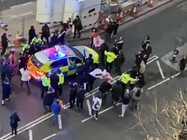 Clashes between police and protesters in Westminster as officers use a police vehicle to escort Labour leader Sir Keir Starmer to safety