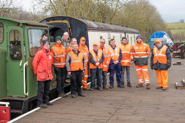 Volunteers celebrate the shunting movement