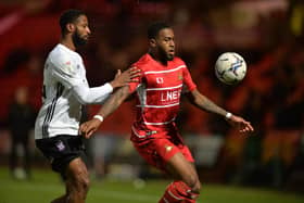 Doncaster Rovers striker Reo Griffiths competes with Ipswich Town rival Janoi Donacien. Picture: Bruce Rollinson.