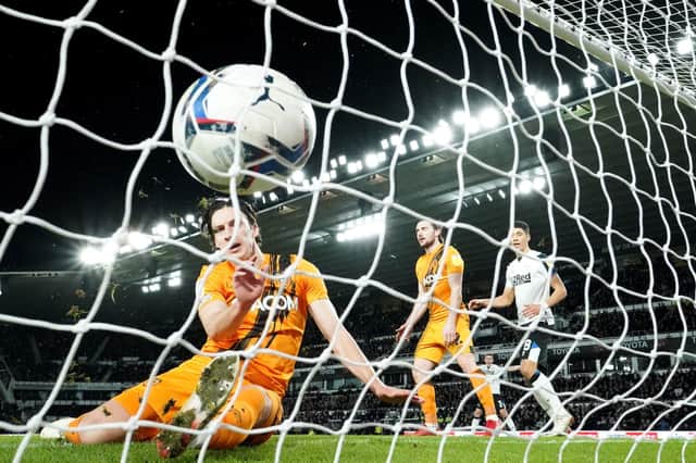 Hull City's Alfie Jones (left) fails to stop Derby County's Tom Lawrence's (not pictured) shot (Picture: PA)