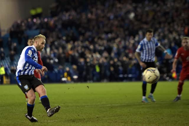 No mistake: Owls' Barry Bannan scores the winning goal from the penalty spot against Wigan. Picture: Steve Ellis