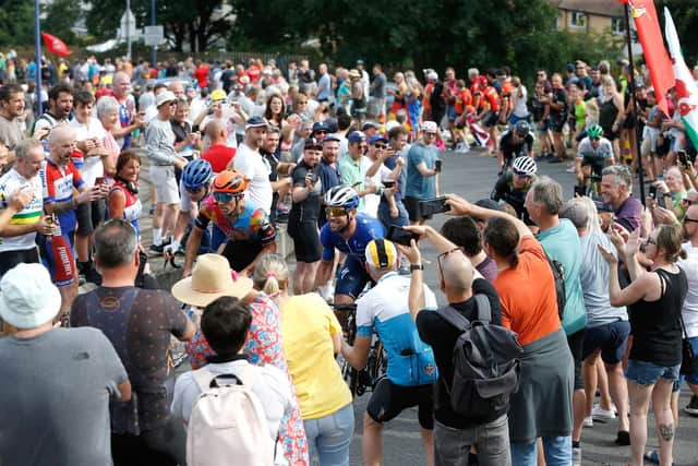 Fans cheer on riders competing in the 2021 Tour of Britain