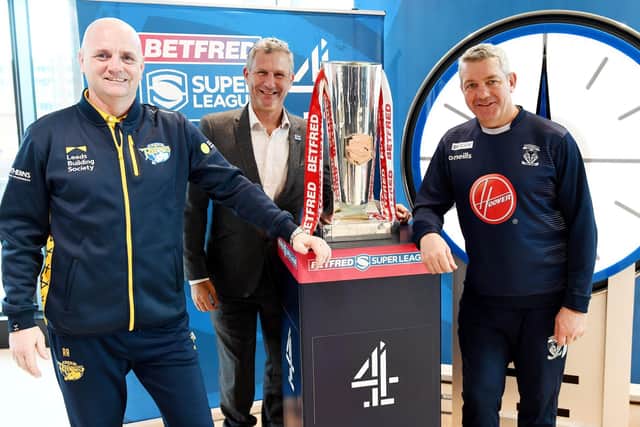 NEW ERA: Opening Channel 4 game preview launch sees presenter Adam Hills, flanked by Leeds Rhinos' coach Richard Agar - left - and Warrington Wolves' Daryl Powell Picture by Simon Wilkinson/SWpix.com