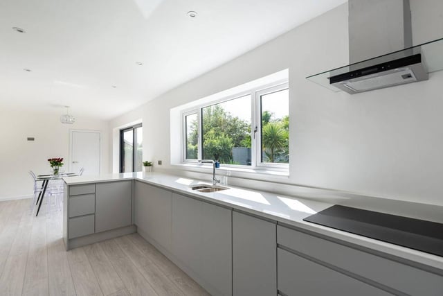 The open plan kitchen diner is the hub of the house. it has has modern fitted units, integrated appliances including two ovens, perfect for those who like to entertain guests.