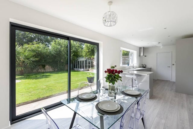 The dining area has ample space for a dining table with sliding patio doors leading out to the rear garden.
