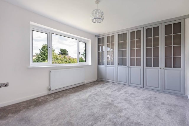 On the first floor is the large master bedroom with attractive fitted wardrobes.