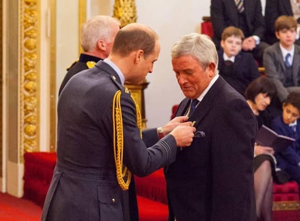 Mike Davies receiving his MBE. Picture supplied by The Principle Trust Children’s Charity