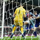 Leeds United's Daniel James (centre) scores their side's second goal of the game at Villa Park (Picture: PA)