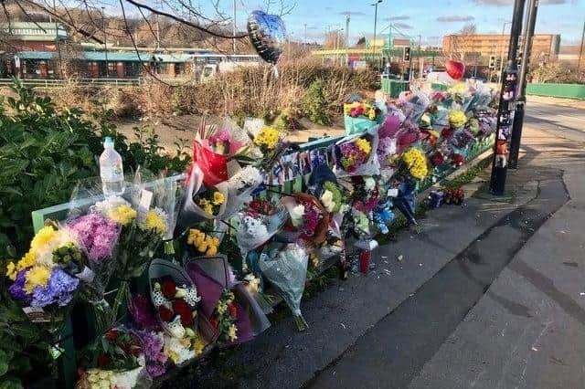 Floral tributes on Meadowhall Way in Sheffield after Tommy Hydes and his nephew, Josh Hydes, both died in a crash