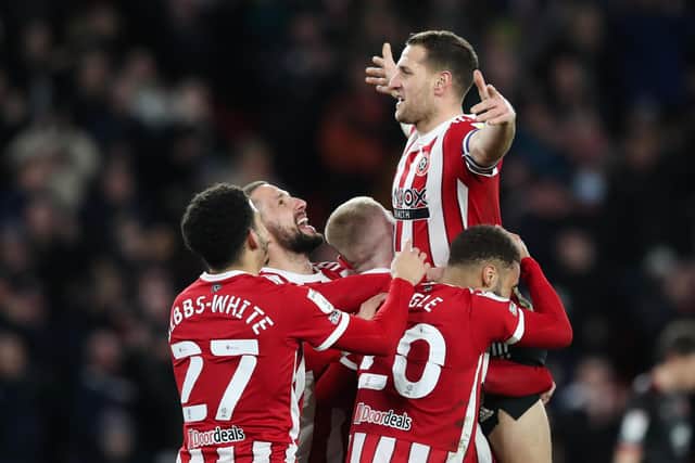 Billy Sharp of Sheffield United celebrates scoring their side's second goal of the game during the Sky Bet Championship match against West Brom (Picture: SportImage)
