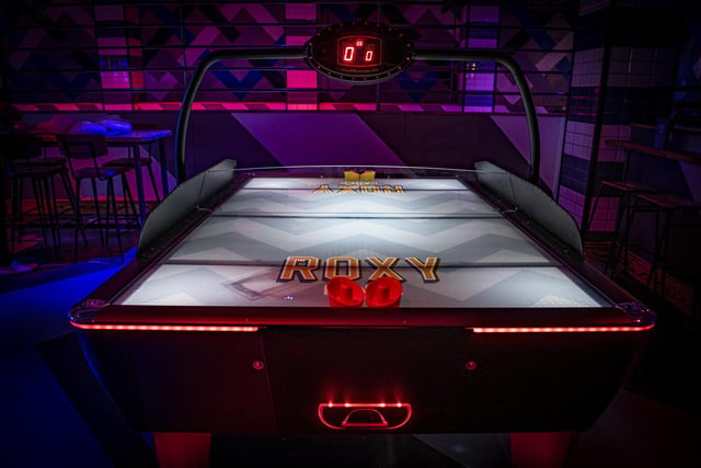 Air Hockey is one of the games on offer at the new and revamped Roxy Lanes offering.