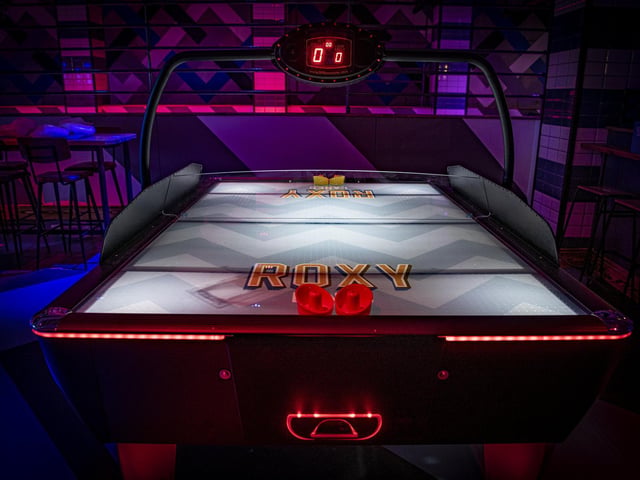 Air Hockey is one of the games on offer at the new and revamped Roxy Lanes offering.