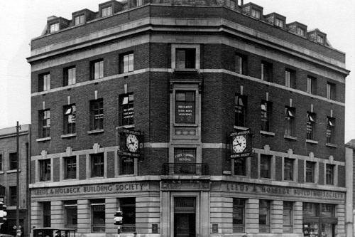 The Leeds and Holbeck Building Society's headquarters in 1930 with the junction of Albion Street to the left and the newly created Headrow to the right.