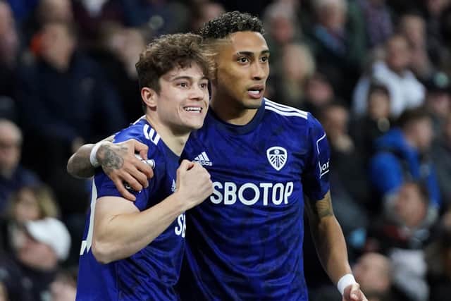 Leeds United's Daniel James (left) celebrates with Raphinha after scoring their side's first goal of the game during the Premier League match at Villa Park, Birmingham. (Picture: PA)