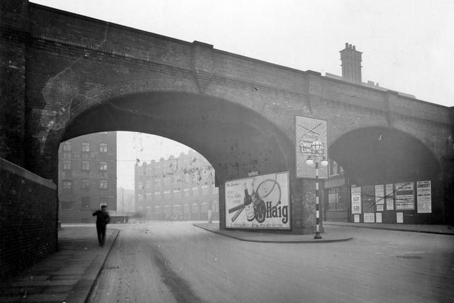 The railway bridge over Duke Street in February 1934. To the left, through the viaduct is York Stree which can be seen the premises of Frazer Brothers, wholesale clothiers. Through the right hand side of the viaduct is the lower window of the Lloyds Arms pub.