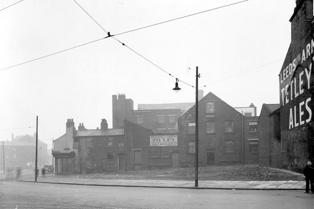 West Street is running across the bottom of this view, then bends round to the left in December 1937. On the right, gable end wall of the Leeds Arms public house.