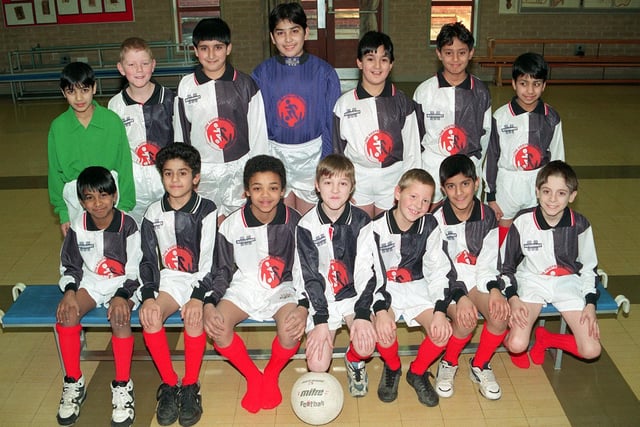 Crossflatts Park Primary football team. Pictured, back row from left, Wasem Muhammed, David Messenger, Shoaib Hussain, Hussain Ditta, Asaf Mahmood, Shaban Akmed, Naweed Omar. Front row, from left, are Rubel Muhammed, Imran Aziz, Leroy Watson, Stephen Commons, David Knowles, Abdul Khan, Divid Kirsopp.