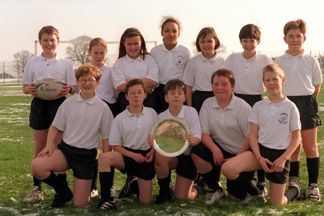 St. Robert's R.C. Primary School rugby team. Pictured, back from left, is Ben Hardy, Janine Maloney, Laura Gundich, Rachel Thomas, Natasha Starkey, James Wignall, Tom Pyle. Front, from left, is Thomas Daniels, Ryan Callaghan, Nicholas Avery, Thomas Donnelly and Richard Greaveson.